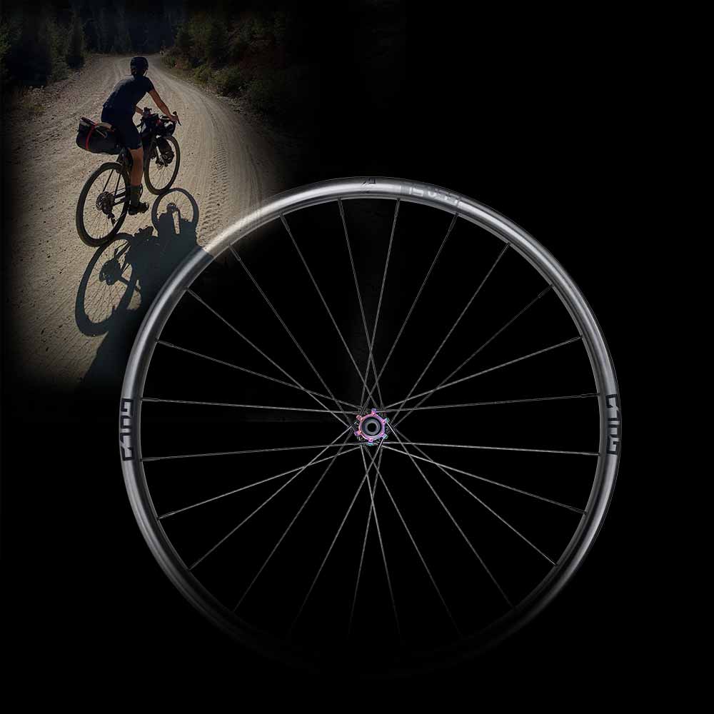 gulo gga sl wheel with gravel rider in backfroun